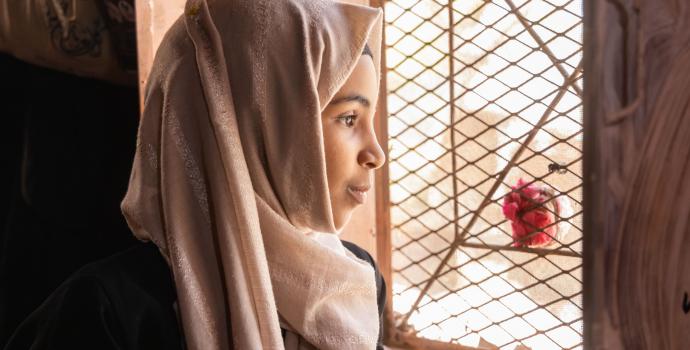 9 Crises You Mustn T Forget About In 2024 Save The Children International   CH1800268 Tamara%2C 13%2C Looks Outside The Window Of Her House In Taiz%2C Yemen Where She Was Severely Injured By A Landmine Explosion Months Earlier 